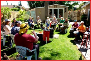 Stephen Dolle facilitates a drumming for wellness workshop at a private home in Orange County
